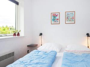 Postel nebo postele na pokoji v ubytování Holiday home Skjern XIX