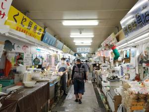 a group of people walking through a market at Hotel Abest Naha Kokusai Street in Naha