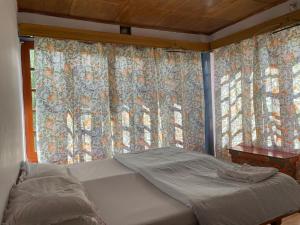 Postel nebo postele na pokoji v ubytování Saiman Guest House + 8 fotografií