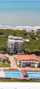 an aerial view of a resort with two swimming pools at Pine Apartment 2 plus 1 in Golem