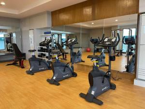 a gym with a bunch of exercise bikes in it at Serin Tagaytay Staycation in Tagaytay