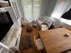 Telewizja i/lub zestaw kina domowego w obiekcie JARA APARTMENT- Ramsau am Dachstein