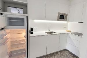 Kuchyň nebo kuchyňský kout v ubytování Precioso Apartamento a 3 minutos de la Playa, con parking gratuito