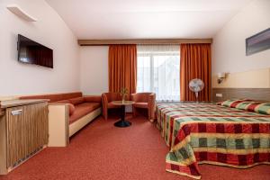 Postel nebo postele na pokoji v ubytování Info Hotel + 37 fotografií