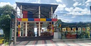 a store front with a colorful at Ramboda holiday Inn in Kotmale