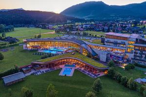 an aerial view of a building with a resort at Aldiana Club Salzkammergut und GrimmingTherme in Bad Mitterndorf