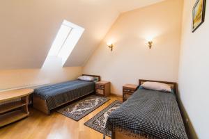 Posteľ alebo postele v izbe v ubytovaní Koncha-Zaspa Spa Hotel