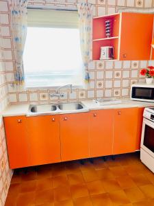 Kuchyňa alebo kuchynka v ubytovaní APARTBEACH BALANDRO CLIMATIZADO y VISTAS MAR
