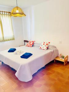 Posteľ alebo postele v izbe v ubytovaní APARTBEACH BALANDRO CLIMATIZADO y VISTAS MAR