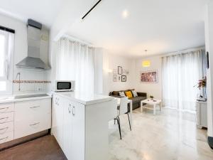 Kuchyňa alebo kuchynka v ubytovaní San Marcos Apartamentos