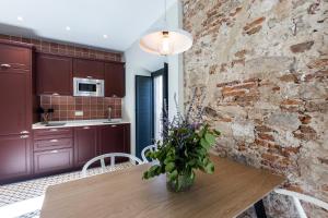 Kuchyňa alebo kuchynka v ubytovaní Apartamentos El Patio, Plaza Mayor Trujillo