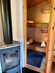 Postel nebo postele na pokoji v ubytování Fjällhalsen Cottages + 29 fotografií