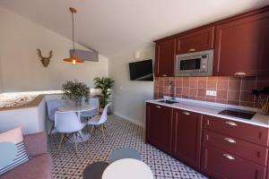 Kuchyňa alebo kuchynka v ubytovaní Apartamentos El Patio, Plaza Mayor Trujillo