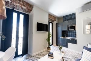 Kuchyňa alebo kuchynka v ubytovaní Apartamentos El Patio, Plaza Mayor Trujillo