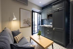 Kuchyňa alebo kuchynka v ubytovaní Apartamentos El Patio, Plaza Mayor Trujillo