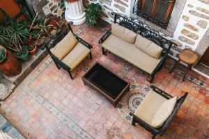 an overhead view of two chairs and a fire pit at Akkan Hotel in Bodrum City