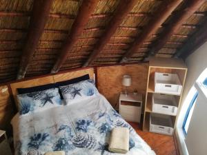 Ein Bett oder Betten in einem Zimmer der Unterkunft Slakkepas 52