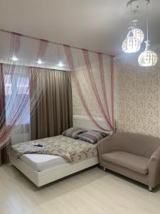 Foto da galeria de 1 комнатная квартира em Astana