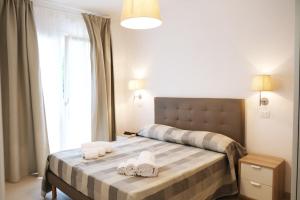 Posteľ alebo postele v izbe v ubytovaní Residence Chanel
