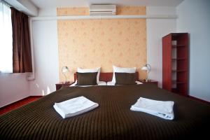 Posteľ alebo postele v izbe v ubytovaní Canada Hotel Budapest