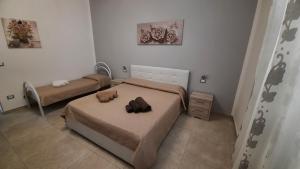 A bed or beds in a room at CASA ARCHIMEDE