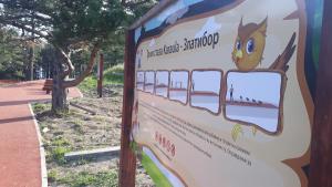 a sign for the interpretive station at the park at Apartment Niva in Zlatibor
