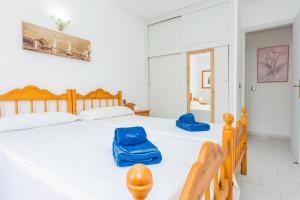 Postel nebo postele na pokoji v ubytování Las Brisas 11 + 15 fotografií