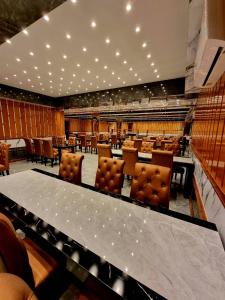 a conference room with a large table and chairs at Grand Parazo Hotel Suvarnbhumi Airport in Bang Bo +53 photos