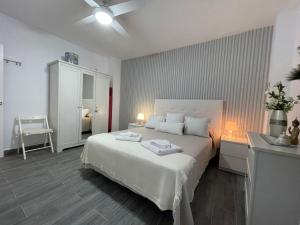 Posteľ alebo postele v izbe v ubytovaní Irina Playa, Apartamentos Living Sur
