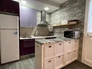 Kuchyňa alebo kuchynka v ubytovaní Irina Playa, Apartamentos Living Sur