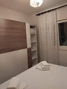 Postel nebo postele na pokoji v ubytování Apartment Marija Marina