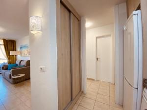 Postel nebo postele na pokoji v ubytování Royal Holiday Home