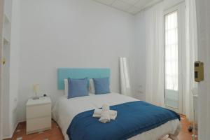 Posteľ alebo postele v izbe v ubytovaní C67 - Shiny 6 Bedrooms in Plaza de la Merced