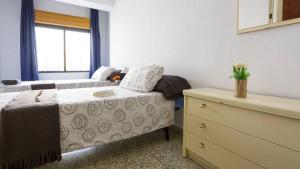 Posteľ alebo postele v izbe v ubytovaní Geranios Wifi en plena Puerta Purchena