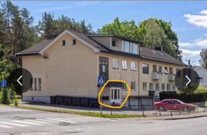 a house with a yellow circle in front of it at Apartment with 2bedrooms near the train and buss station in Moss