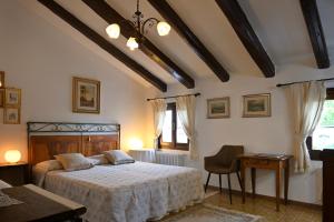 Postel nebo postele na pokoji v ubytování B&B Four Winds