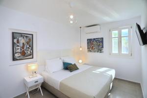 Posteľ alebo postele v izbe v ubytovaní Villa Livadi + 37 fotografií