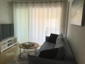 TV a/nebo společenská místnost v ubytování Apartmani Ruzmarin