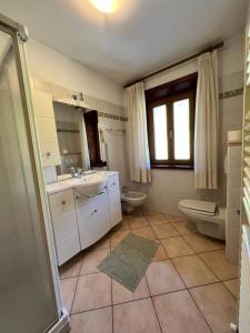 Kúpeľňa v ubytovaní Casa Savio + 26 fotografií
