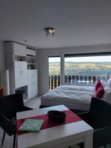 Postel nebo postele na pokoji v ubytování Loreley Lounge II