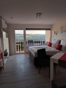 Nespecifikovaný výhled na hory nebo výhled na hory při pohledu z apartmánu