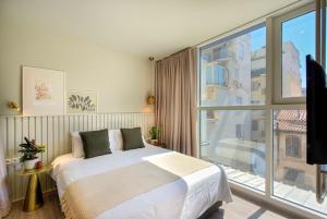 Katil atau katil-katil dalam bilik di 9 Muses Exclusive Suites In Syntagma