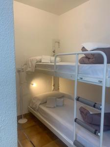 Dviaukštė lova arba lovos apgyvendinimo įstaigoje CAPIROLA - K12 DeuSol - Estudio - Vall d'Incles - Soldeu