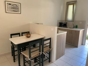 Kuchyňa alebo kuchynka v ubytovaní Casa Buganvilla