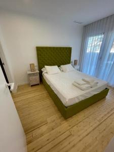 Postel nebo postele na pokoji v ubytování Denia, apartamento a estrenar con jardín privado, piscina y vistas al mar