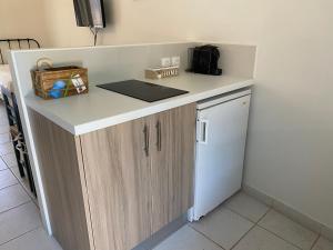 Kuchyňa alebo kuchynka v ubytovaní Casa Buganvilla