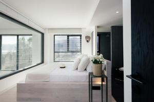 Ένα ή περισσότερα κρεβάτια σε δωμάτιο στο Mayeia Villas