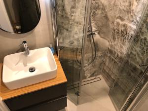 Kúpeľňa v ubytovaní Umi Apartament