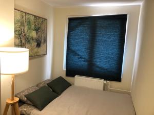 Posteľ alebo postele v izbe v ubytovaní Umi Apartament