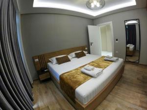 Katil atau katil-katil dalam bilik di HOTEL BRAXTON